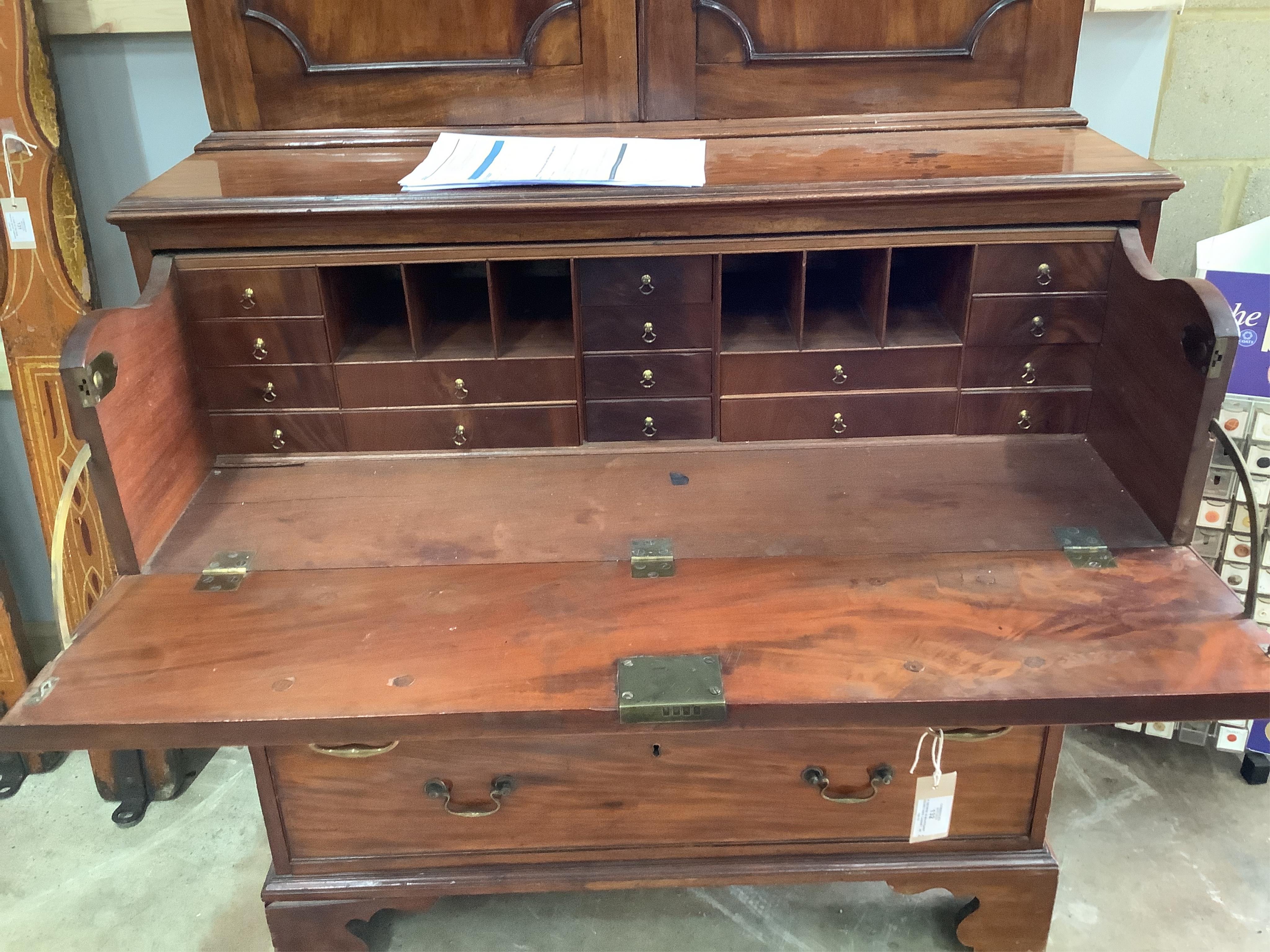 A George III mahogany secretaire cabinet, width 108cm, depth 56cm, height 213cm. Condition - fair